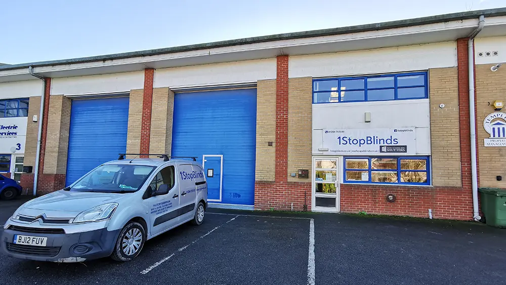 The 1 Stop Blinds workshop and showroom on Eastern Way, Bury St Edmunds, with the company van parked outside